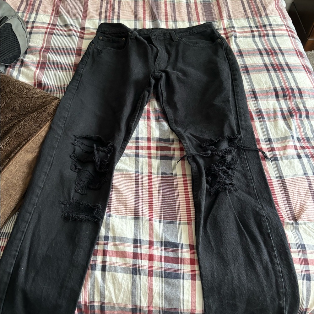 Ripped Levi black jeans